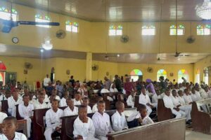 Students at mass in Saints Simon and Jude Seminary