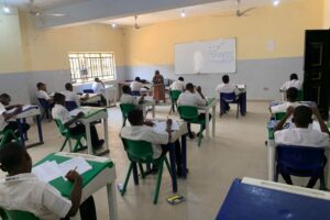 junior students in their classroom at Saints Simon and Jude Seminary
